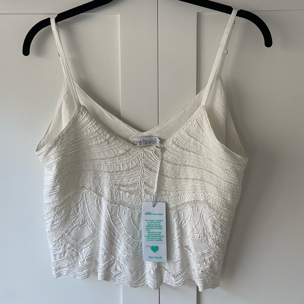 Cream Crop top with embroidery and lace details. Lined. Never worn.